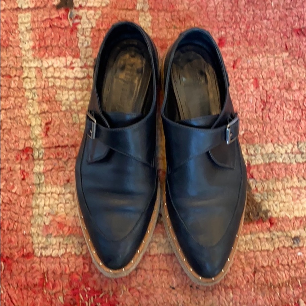 Black buckle loafers